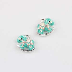 Detailed view of mint green rocking horse charms with silver metal alloy for jewelry DIY