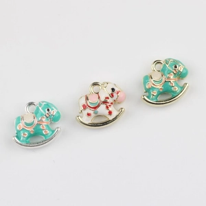 Enamel rocking horse pendants in white and teal for DIY jewelry making and crafts