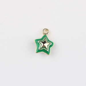 Detailed close-up of green enamel star pendant with a gold star center for DIY jewelry