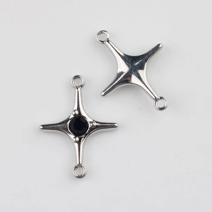 Detail of silver alloy star connector charm with black zircon for DIY jewelry making