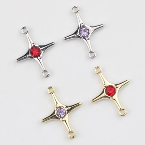 Detailed view of alloy star connectors with zircon stones for DIY jewelry making