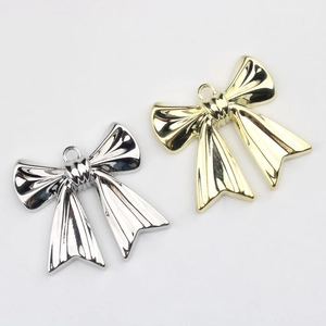Colgantes de lazo en oro y plata pulida para creación de joyas DIY y collares