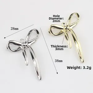 Golden and silver alloy bow pendants for DIY jewelry making with precise dimensions