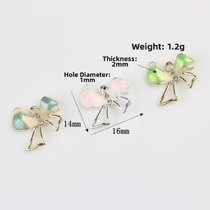 Bow-shaped alloy pendants with zircons and gradient colors for DIY jewelry making