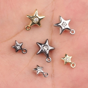 Pendentifs étoile en alliage avec zircons sertis, finitions or, argent et noir fusil