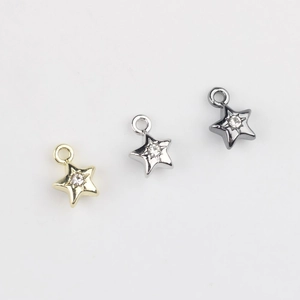 Pendentifs étoile en alliage avec zircone en finitions or, argent et noir pour bijoux
