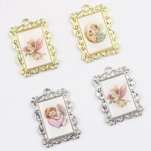 Baroque style cherub pendants in gold and silver metal frames for DIY jewelry making