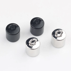 Polished silver and matte black cylindrical metal pendants with rings for DIY jewelry craft