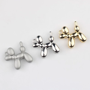 Three balloon dog alloy pendants in gold, silver, and matte grey for DIY jewelry crafts