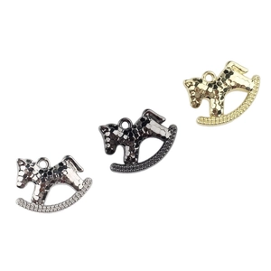 Minimalist alloy rocking horse charms in gold, silver, and black with hammered texture