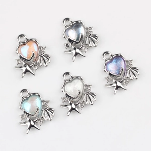 DIY heart shell and starfish pendants with colorful resin and rhinestones for jewelry making