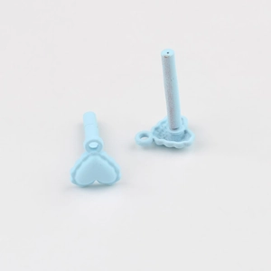Close-up of matte light blue heart-shaped DIY alloy jewelry accessories for earrings