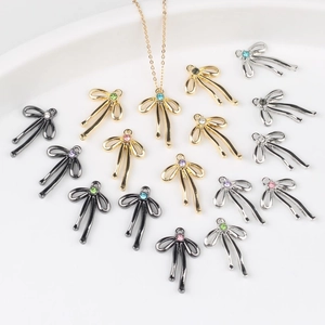 Pendentifs nœuds en cristal doré et argenté pour la création de bijoux DIY élégants