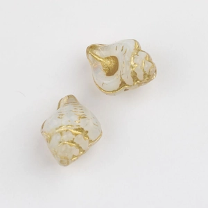Detail of seashell Czech glass beads with vintage gold accents for DIY jewelry making