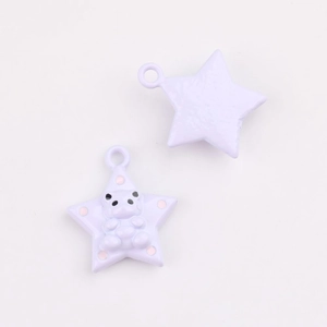 Detail of lavender star-shaped charm with cute panda relief and hanging loop for DIY jewelry