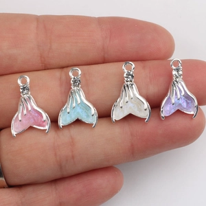 Set of four colorful resin mermaid tail pendants with shiny sequins and crystal accents