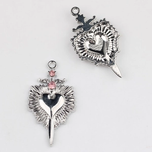 Detailed front and back view of alloy heart pendant with pink zircon and sword design