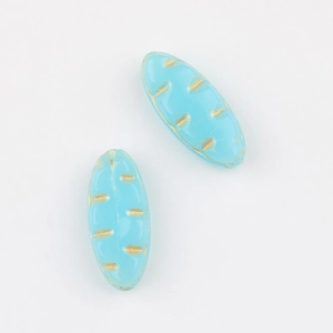 Detail of light blue Czech glass leaf beads with gold leaf patterns for DIY jewelry making