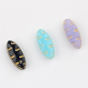 Czech glass leaf beads with gold accents in black blue and purple for DIY jewelry