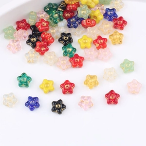 Handmade Czech glass star beads with gold-rimmed detail in assorted vibrant colors