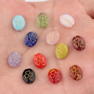 Colorful Czech glass clover beads with gold detailing for DIY jewelry making sets