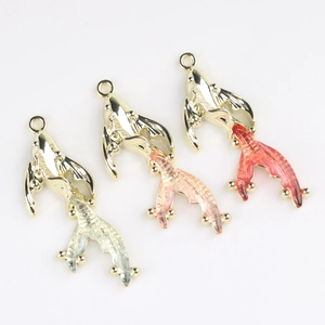 Three goldfish resin pendants with gold alloy frames in white, pink, and red for DIY jewelry