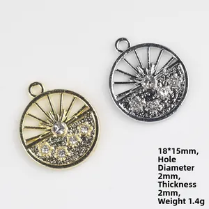 Detailed view of hollow flower charms with cubic zirconia inlay in gold and silver finish