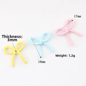 Pendentifs nœuds colorés en résine pour bijoux DIY en jaune, bleu et rose clair