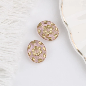 Detail of pink Czech glass flower beads with gold floral painting for DIY jewelry