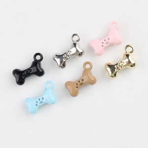 Colorful bone-shaped alloy pendants with paw prints for DIY jewelry making and pet tags