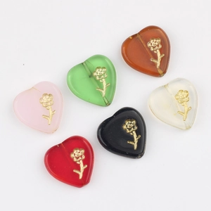 Handmade Czech glass heart beads with gold floral patterns for DIY jewelry making