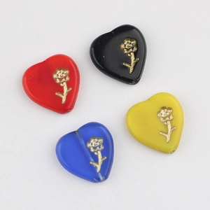 Czech glass heart beads with gold floral details in red black blue and yellow