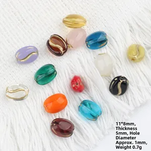 Czech glass coffee bean beads in various colors with gold patterns for DIY jewelry making