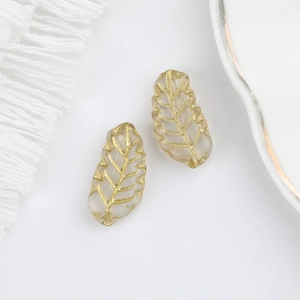 Detail of 15x7mm Czech glass leaf beads with gold gilding for DIY jewelry making