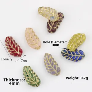 15x7mm Czech glass leaf beads with gold vein detailing in seven vibrant colors for DIY