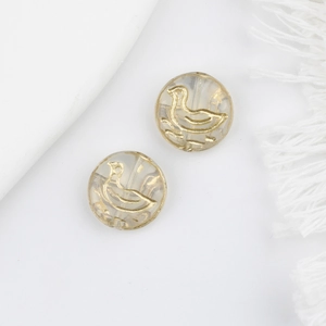 Detail of 11mm glass duck beads with gold engraving for DIY jewelry making