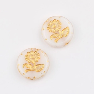 Detail of Czech glass beads with gold hand-painted sunflower pattern for DIY jewelry