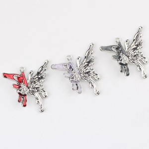 Detailed view of alloy butterfly pendants with red, purple, and black enamel wings