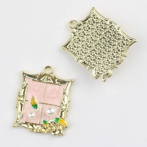 Detailed view of Monet Garden alloy charm with pink enamel, pearl inlay and star textured back