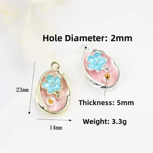 Detailed dimensions of Monet garden floral pendant with size 23x14mm and pearl inlay