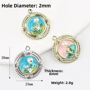 Detailed view of enamel Monet garden charms with pearls and measurements 26x23mm