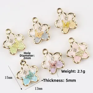 Floral butterfly pendants in six pastel enamel colors for DIY jewelry making