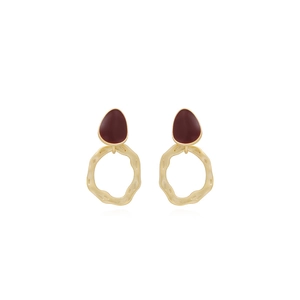 Minimalist matte dark red and irregular gold ring earrings on a clean white background