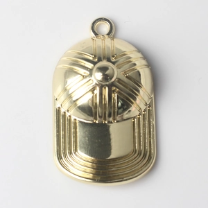 Detailed top view of gold baseball cap pendant with metallic texture for jewelry making
