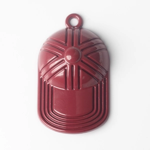 Detailed view of glossy burgundy baseball cap pendant with embossed stitch texture