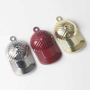 Three metallic baseball cap charms in silver, gold, and red for DIY jewelry making
