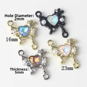 Iridescent heart butterfly charms for DIY jewelry making in gold, silver, and black, 23x16mm