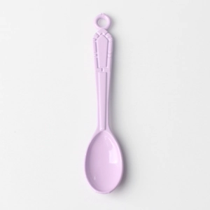 Detailed view of lavender alloy spoon charm with smooth finish and top hanging loop
