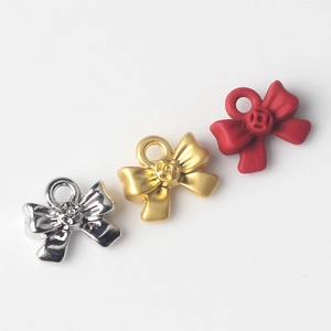 Tres colgantes de lazo en aleación plata, oro y rojo para creación de joyería DIY