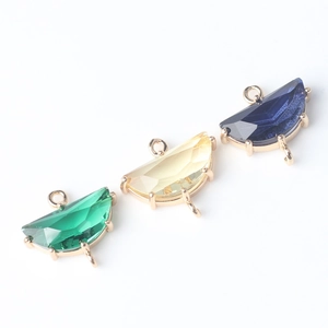 Faceted crescent natural stone pendants in green, yellow, and blue with gold double loops